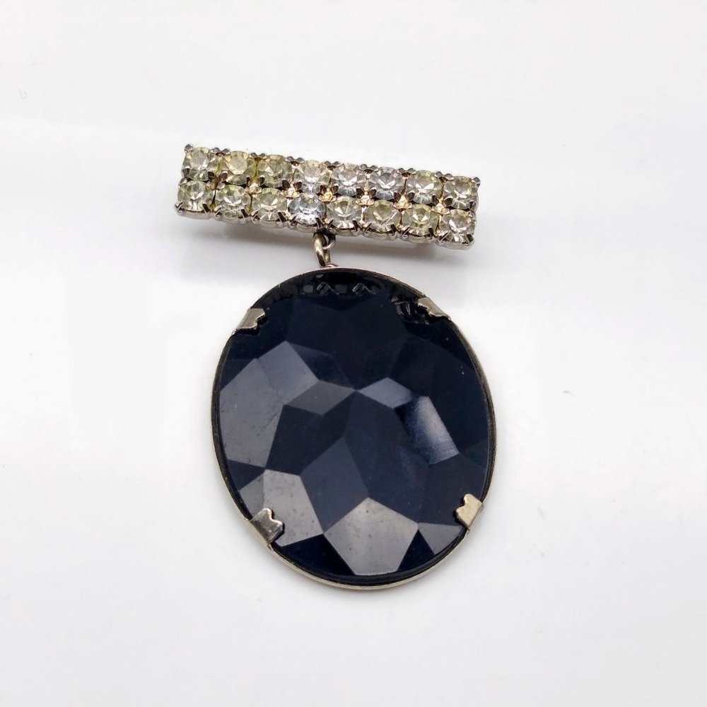 Vintage Glitz Brooch with Dangling Faceted Black Cabochon Oval in Silver Tone